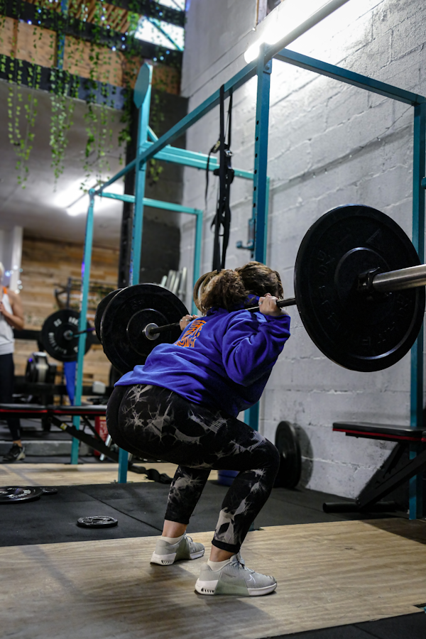 Sarah coaching a group class